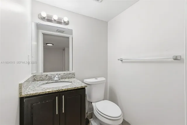 a view of a house with a tree