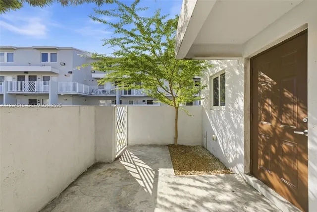a house view with a outdoor space