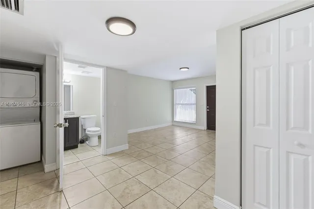 a view of an empty room and window