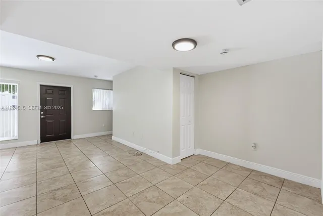wooden floor in an empty room and closet area