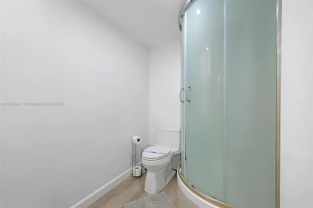a bathroom with a toilet and a sink