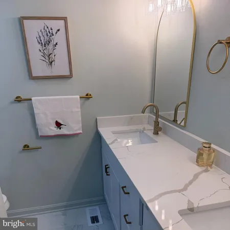 a bedroom with bed and a window