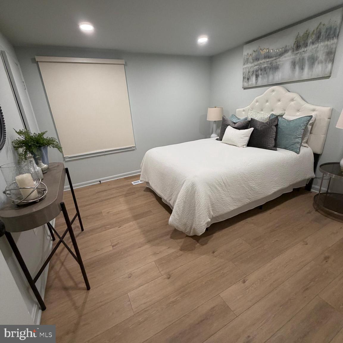 4426 Cub Run Road Chantilly, VA 20151 - Photo 14 of 24 a bedroom with a bed and a potted plant on the table
