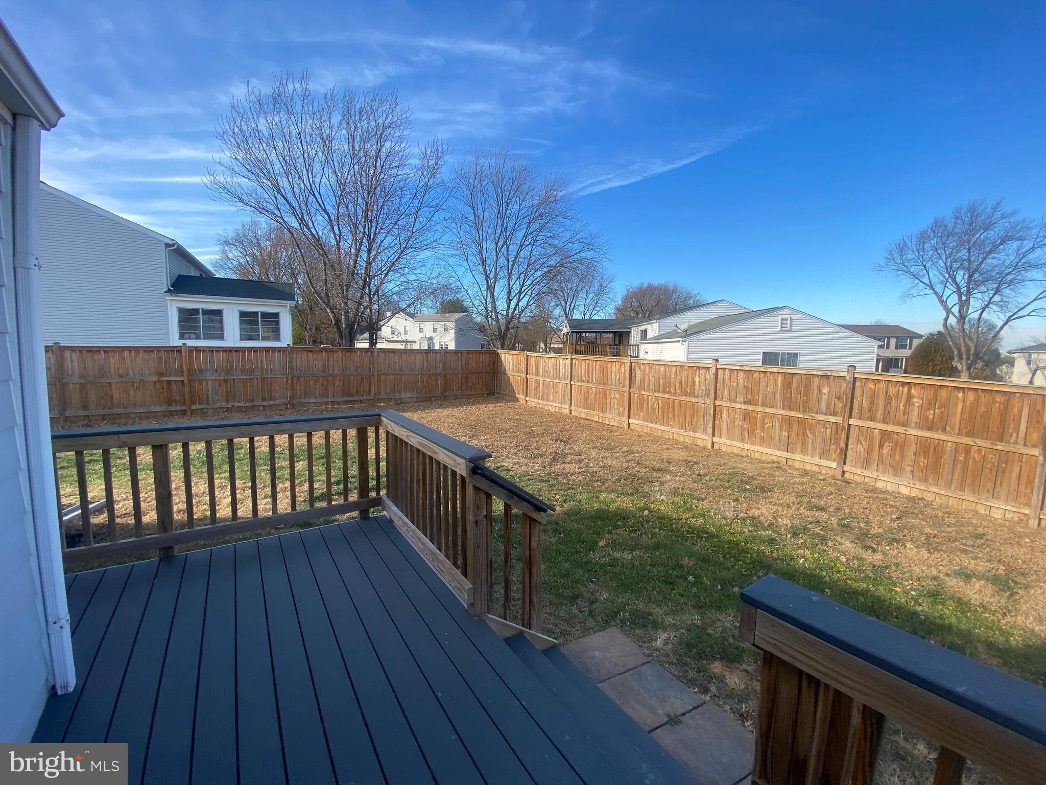 4426 Cub Run Road Chantilly, VA 20151 - Photo 22 of 24 a view of a wooden deck and a yard