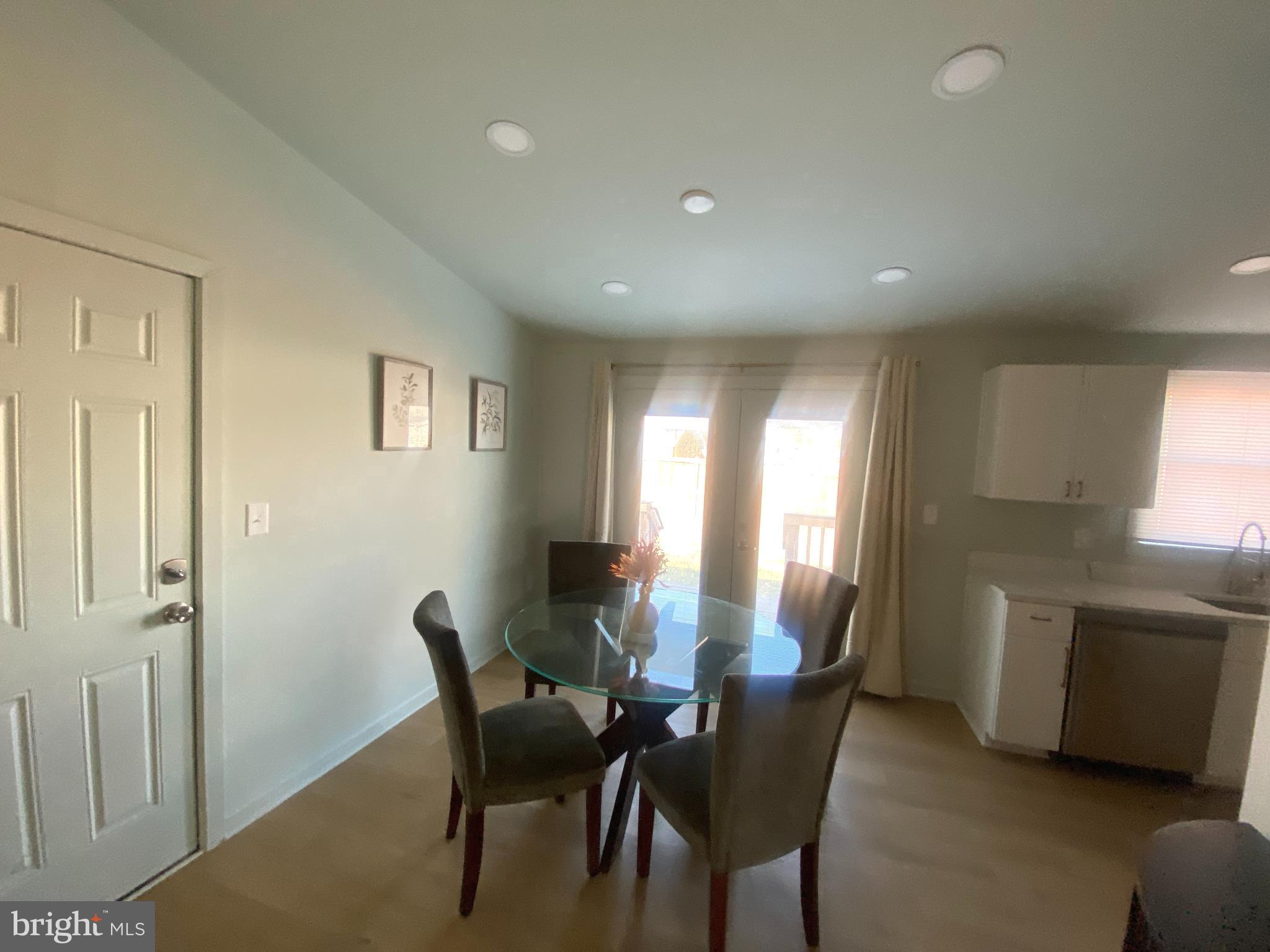4426 Cub Run Road Chantilly, VA 20151 - Photo 4 of 20 a view of a dining room with furniture and window