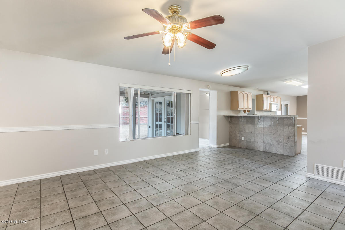 7761 North Rasmussen Avenue Tucson, AZ 85741 - Photo 3 of 23 a view of an empty room with a window