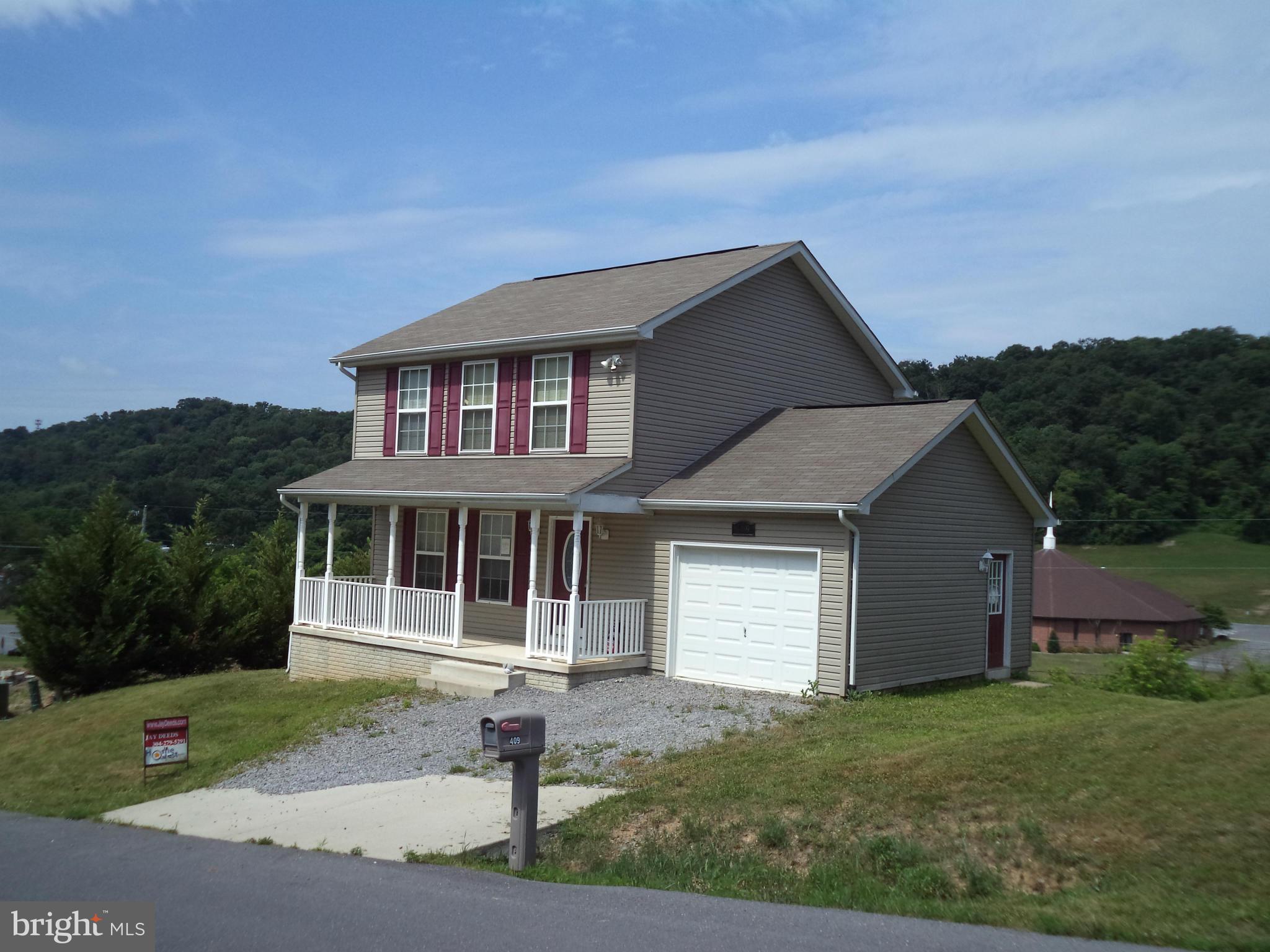 409 Whispering Wind Road Hancock, MD 21750 - Photo 1 of 22 Exterior (Front)