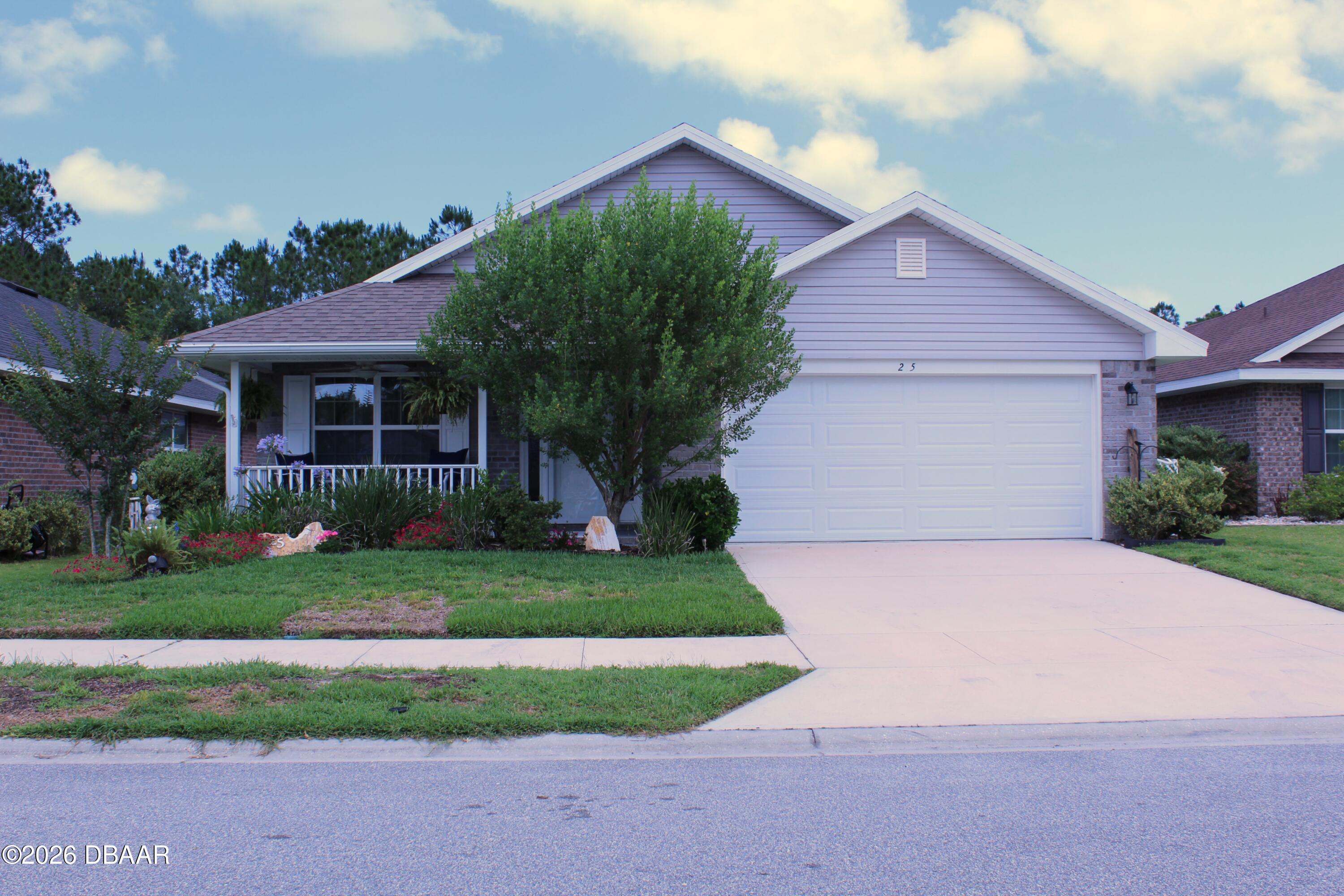 25 Rivertown Road Palm Coast, FL 32137 - Photo 1 of 16 Exterior front view