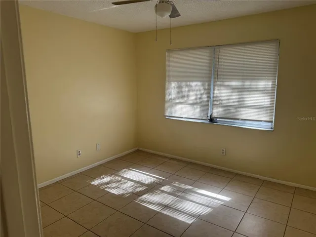 a view of a room that has a window in it