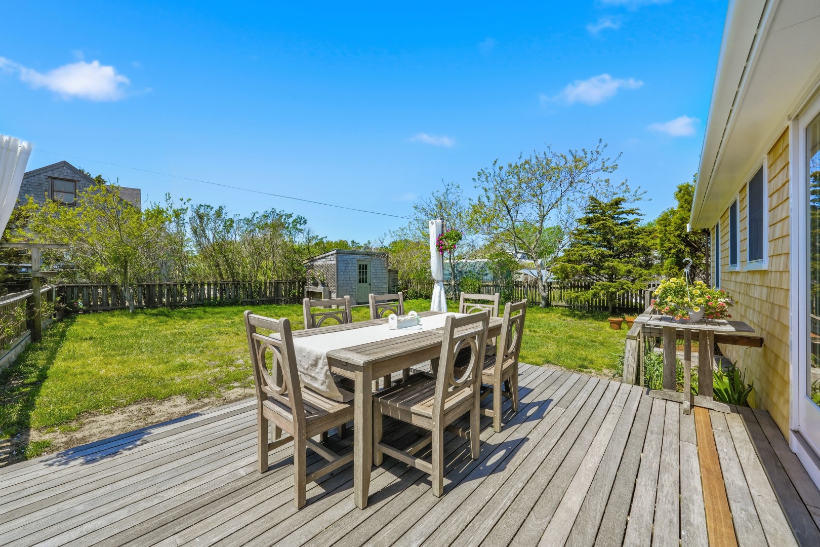 3 Newtown Road Nantucket, MA 02554 - Photo 19 of 20 a view of a backyard with furniture and garden