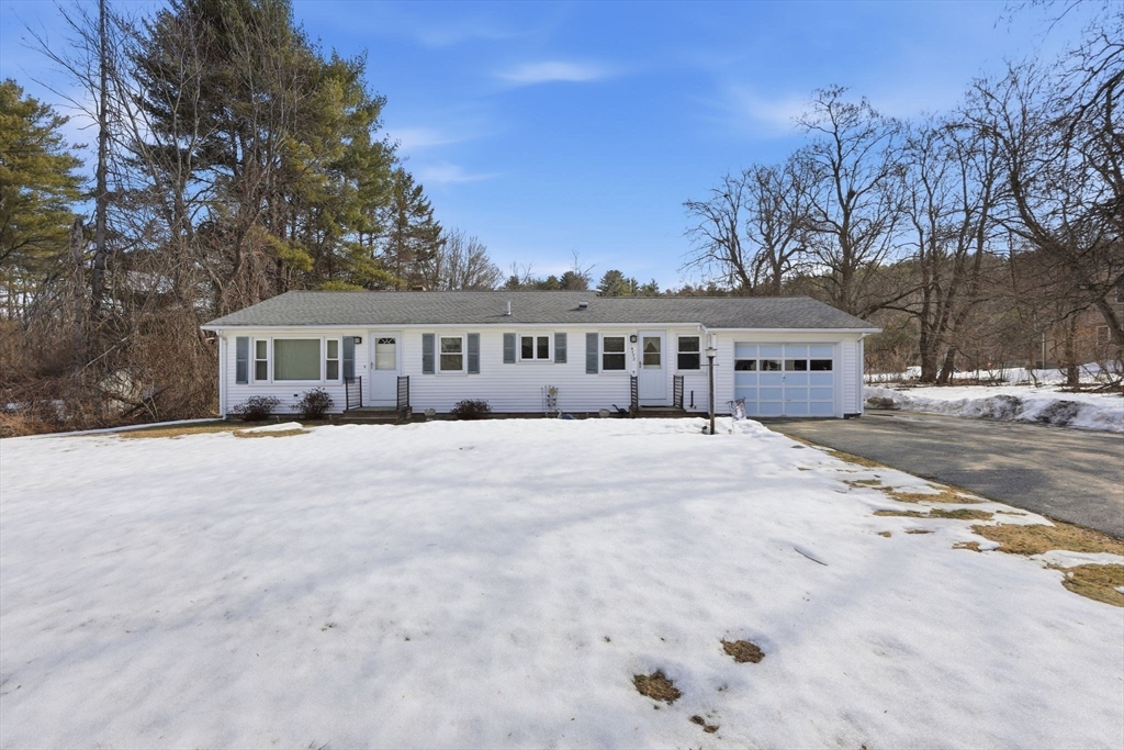 4452 High Street Palmer, MA 01069 - Photo 1 of 41 a view of house with yard and trees in the background