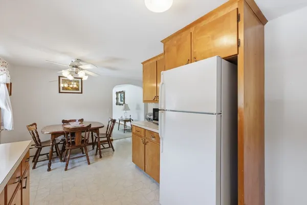 a view of dining room with furniture and chandelier