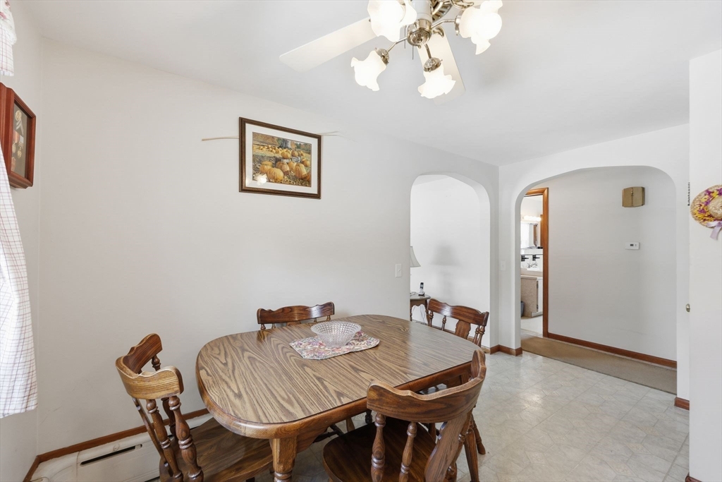 4452 High Street Palmer, MA 01069 - Photo 16 of 41 a view of a dining room with furniture and wooden floor