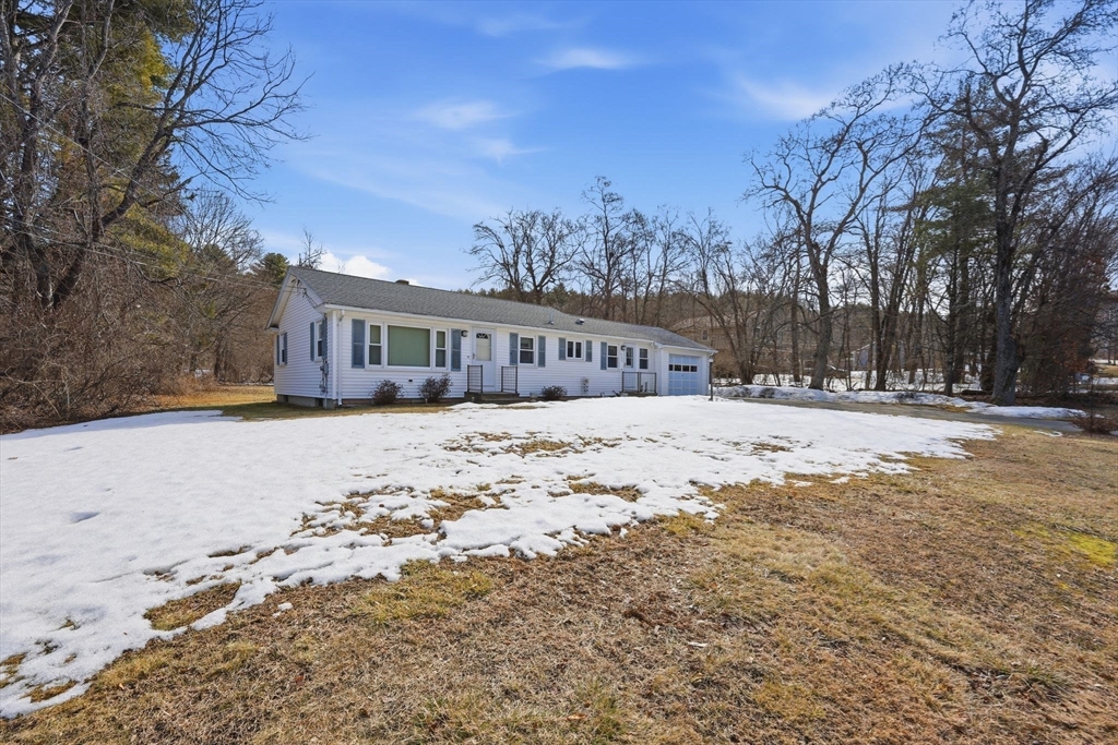 4452 High Street Palmer, MA 01069 - Photo 37 of 41 a view of large house with a yard covered in snow