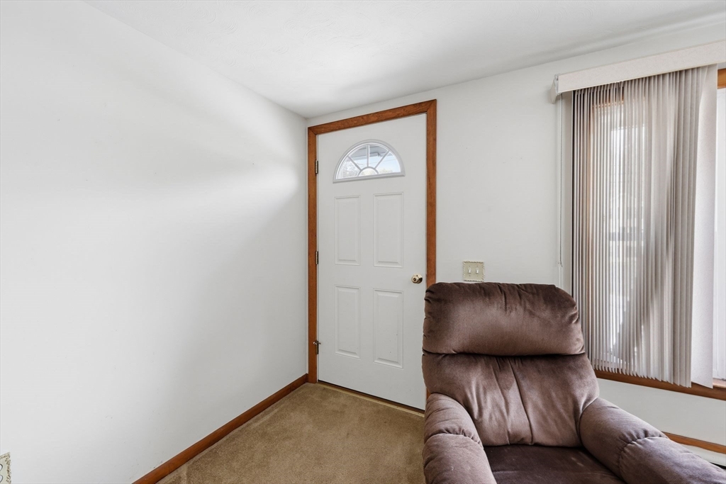 4452 High Street Palmer, MA 01069 - Photo 4 of 41 a livingroom with furniture and a window