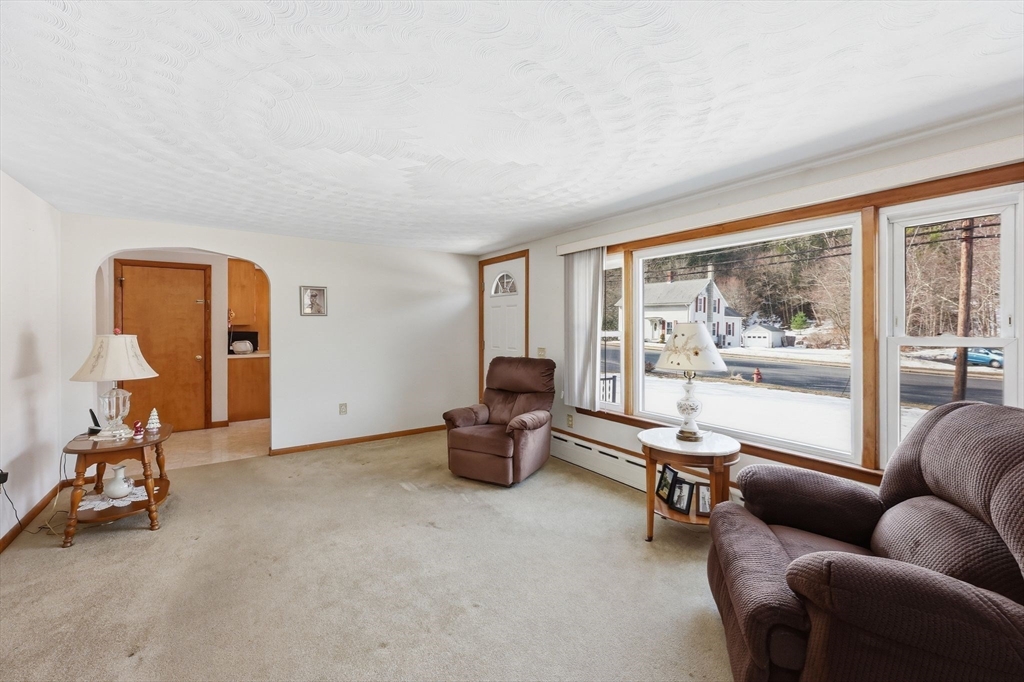 4452 High Street Palmer, MA 01069 - Photo 7 of 41 a living room with furniture and a large window