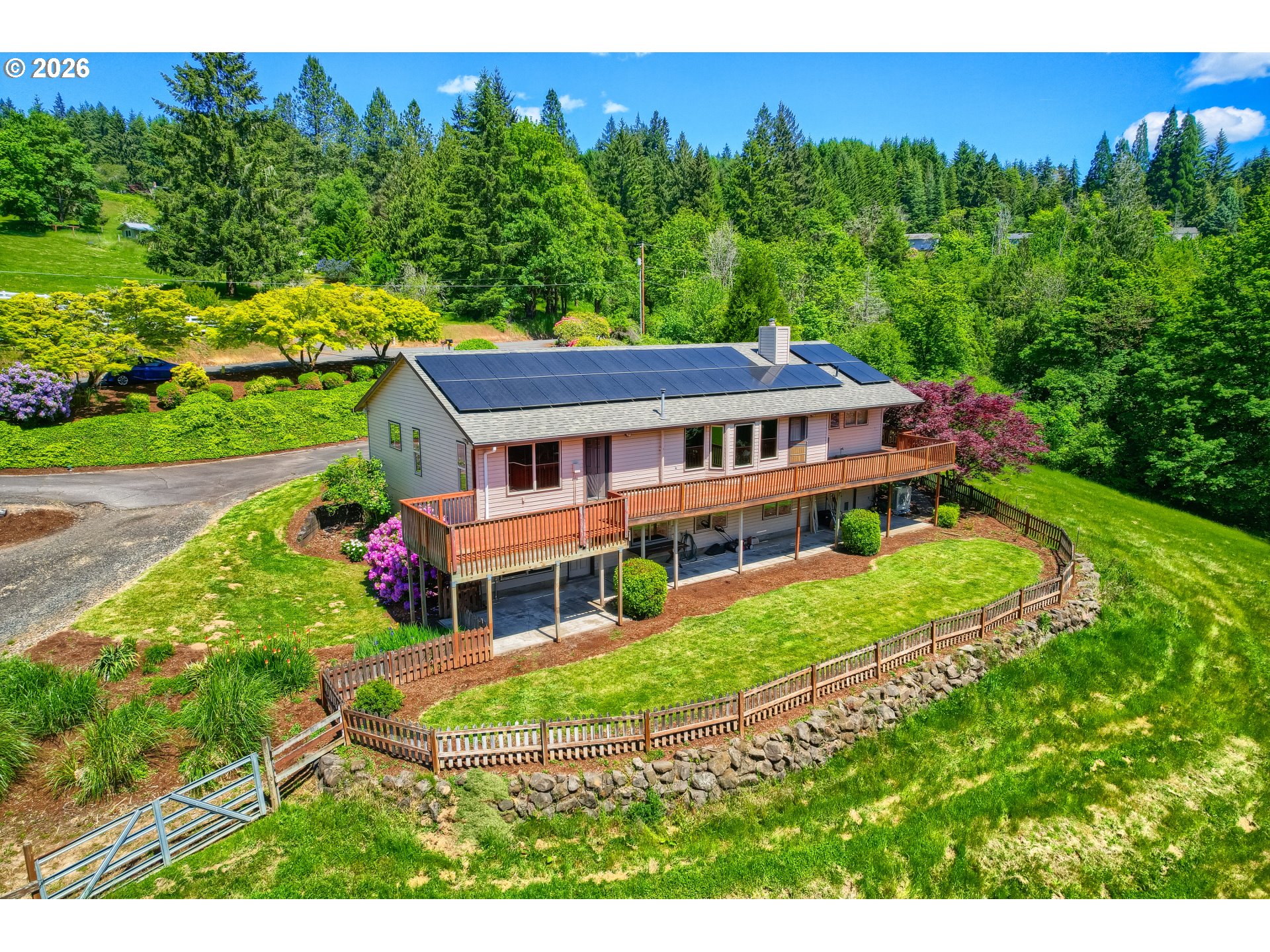 45354 Northwest Hartwick Road Banks, OR 97106 - Photo 33 of 35 a view of a house with a big yard plants and large trees