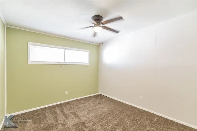 a view of a room with a window