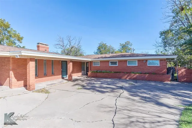 a view of a house with a patio