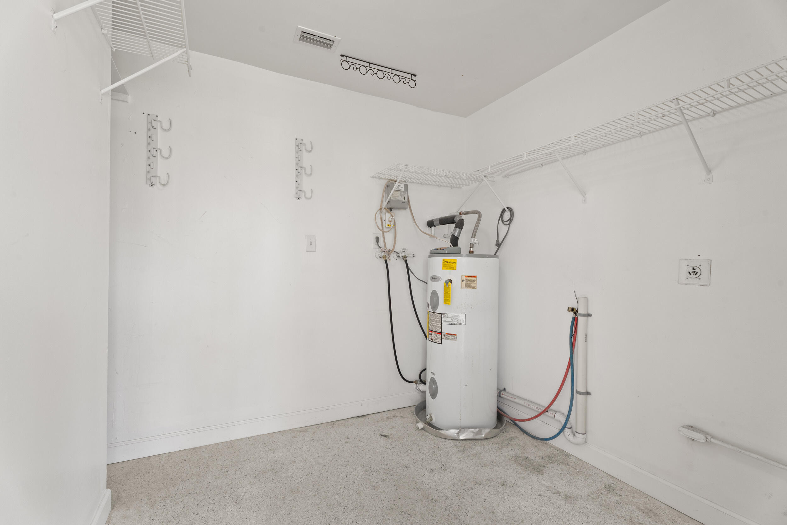 1459 Southwest Seahawk Way Palm City, FL 34990 - Photo 22 of 43 a utility room with a shower and dryer