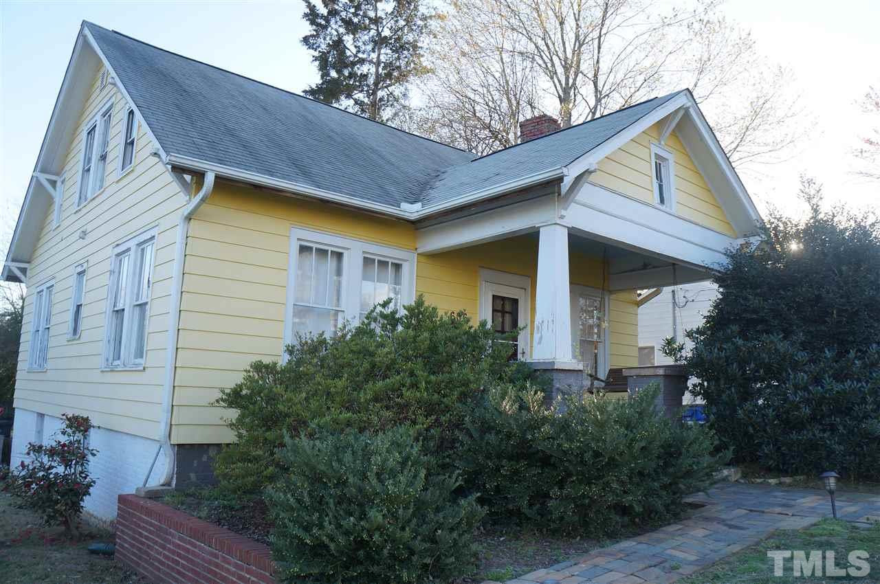 606 Sasser Street Raleigh, NC 27604 - Photo 2 of 22 a front view of house with a garden