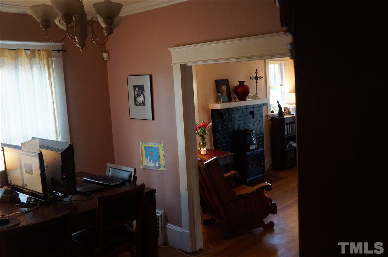 606 Sasser Street Raleigh, NC 27604 - Photo 11 of 22 a view of a workspace with furniture and a window