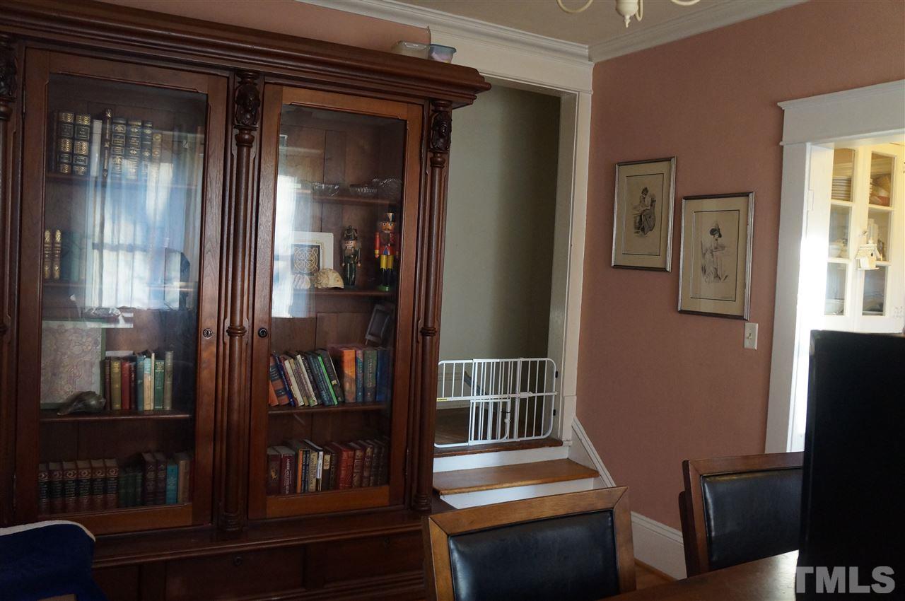 606 Sasser Street Raleigh, NC 27604 - Photo 12 of 22 a view of entryway and hall with wooden floor