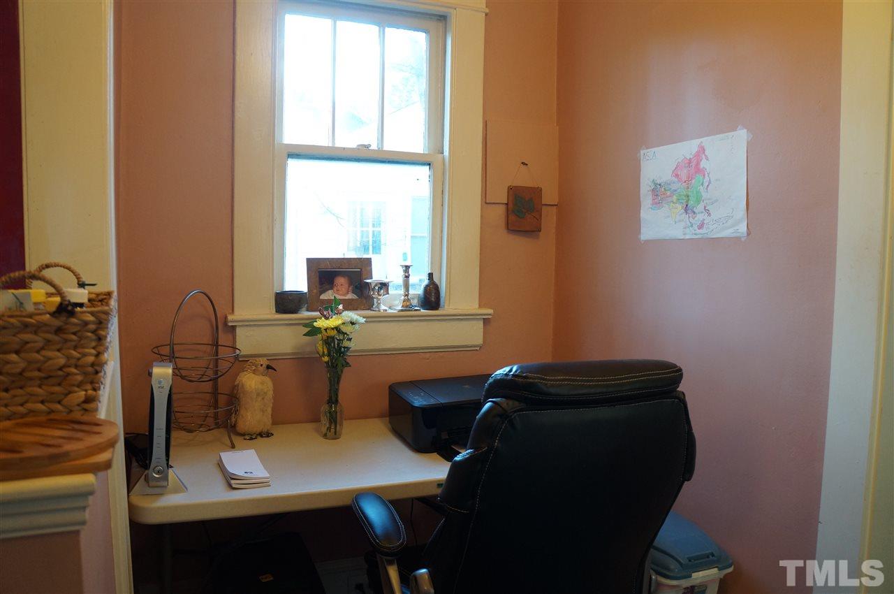 606 Sasser Street Raleigh, NC 27604 - Photo 13 of 22 a view of a workspace with furniture and a window