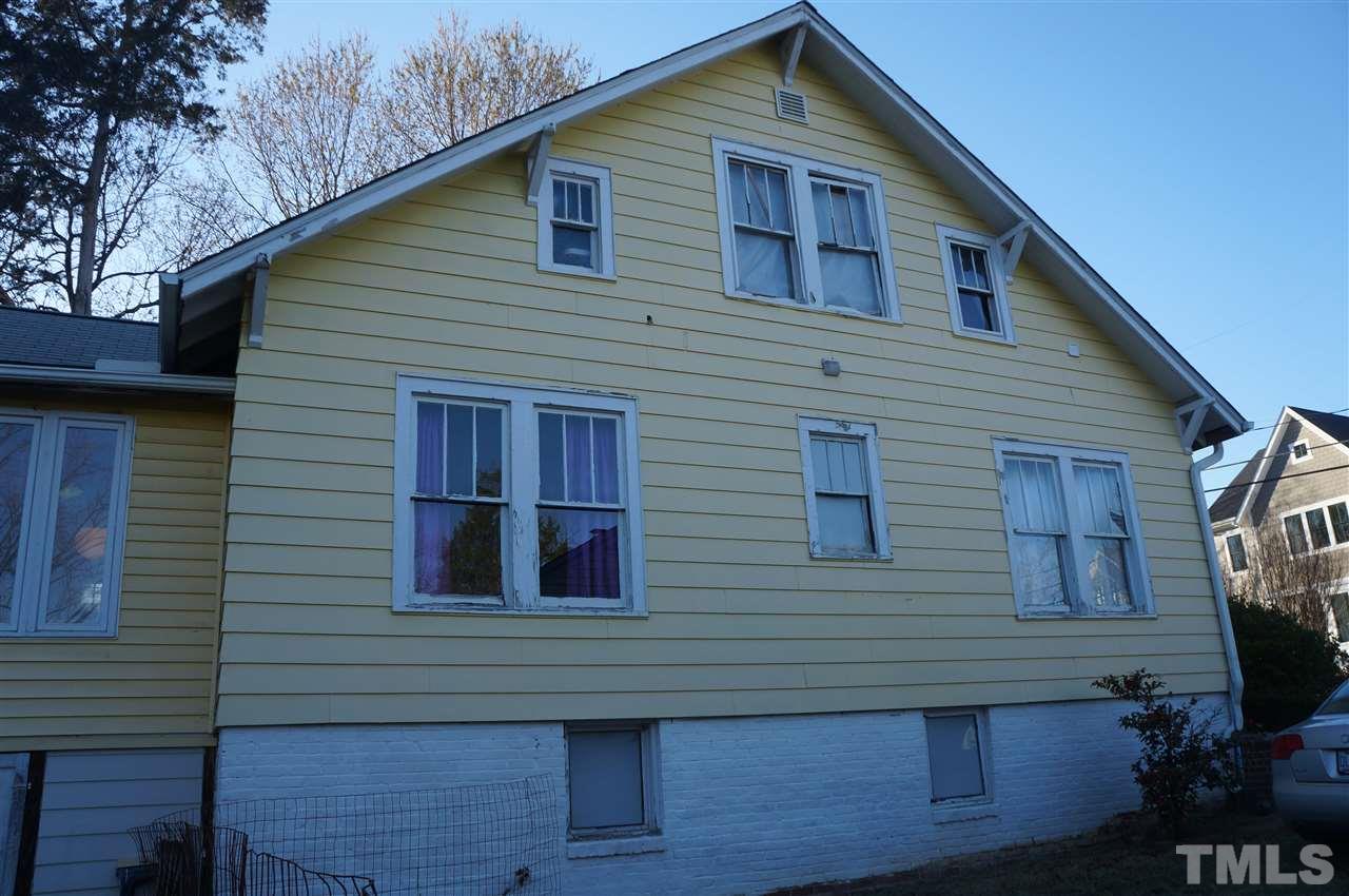 606 Sasser Street Raleigh, NC 27604 - Photo 18 of 22 a view of a house with wooden fence