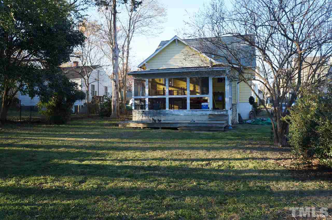 606 Sasser Street Raleigh, NC 27604 - Photo 19 of 22 a front view of a house with a yard