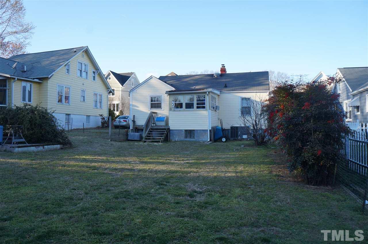 606 Sasser Street Raleigh, NC 27604 - Photo 20 of 22 a view of a house with a back yard