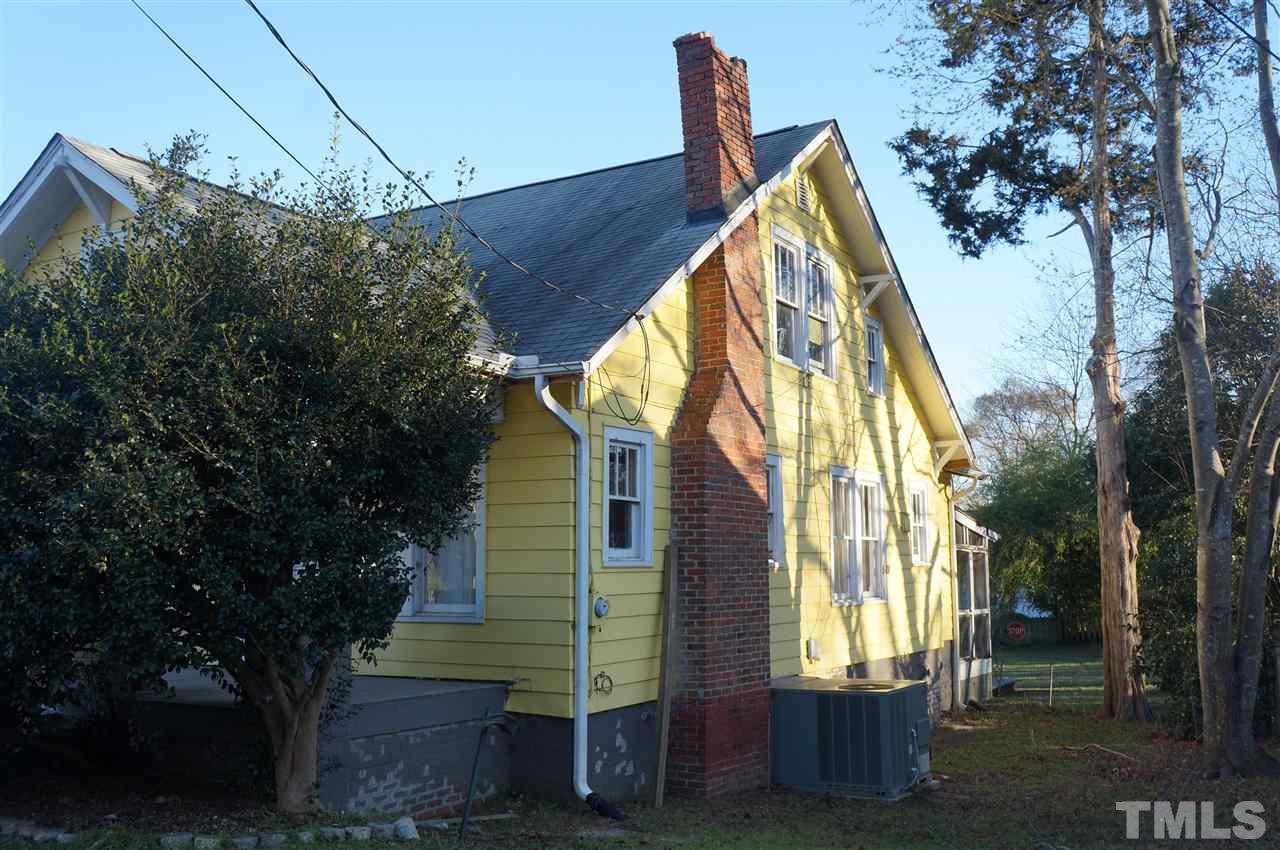 606 Sasser Street Raleigh, NC 27604 - Photo 22 of 22 a view of a house with a yard