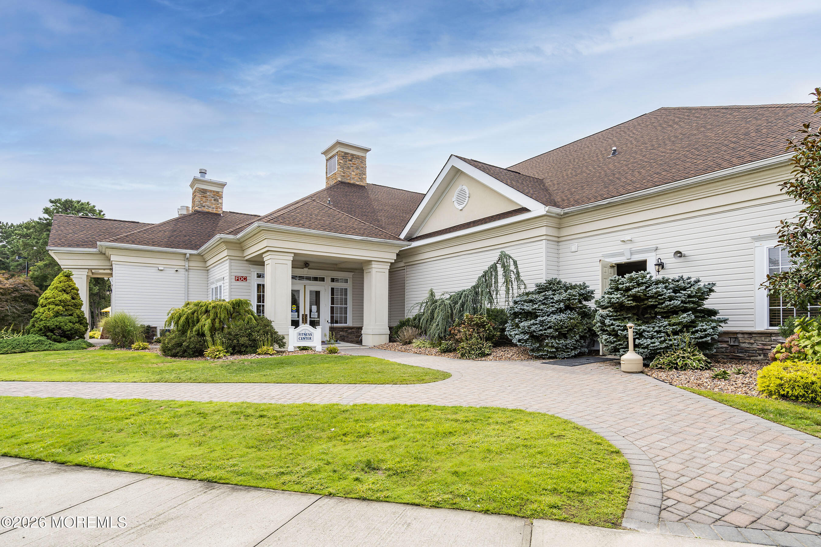 8 Fairhaven Way Waretown, NJ 08758 - Photo 15 of 68 a front view of a house with garden