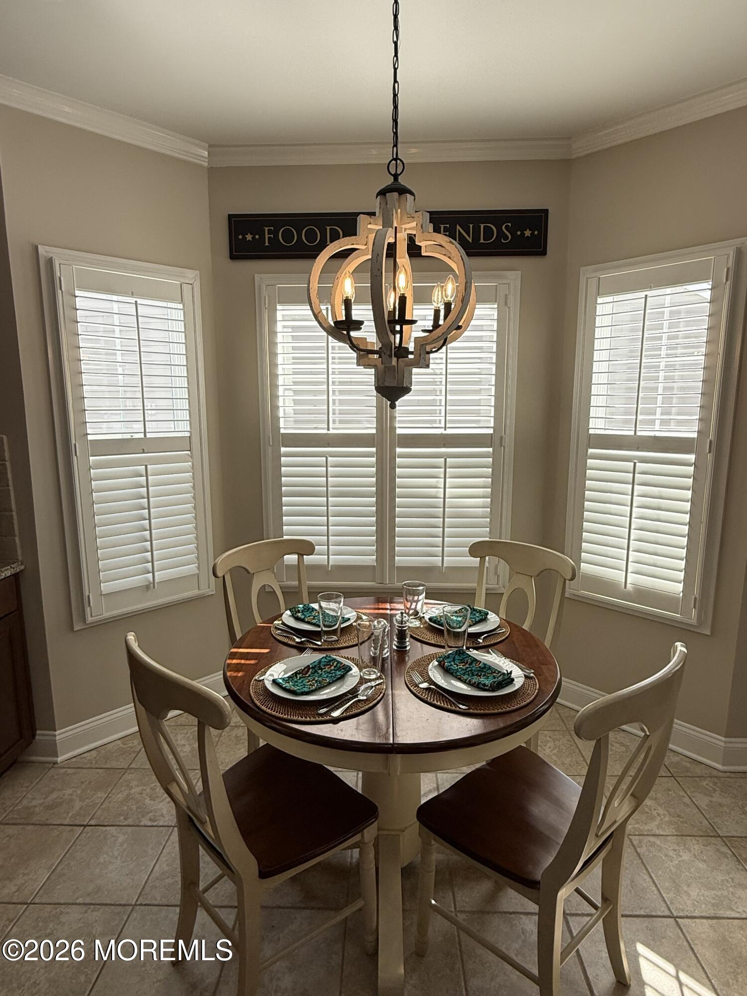 8 Fairhaven Way Waretown, NJ 08758 - Photo 32 of 68 a dining room with furniture a chandelier and window