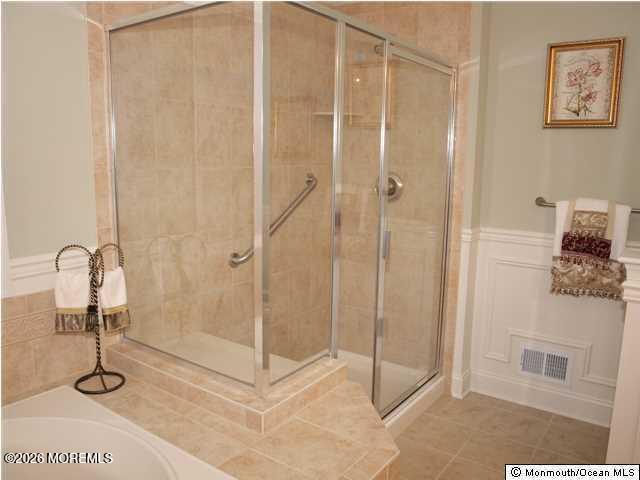 8 Fairhaven Way Waretown, NJ 08758 - Photo 4 of 68 a bathroom with a shower