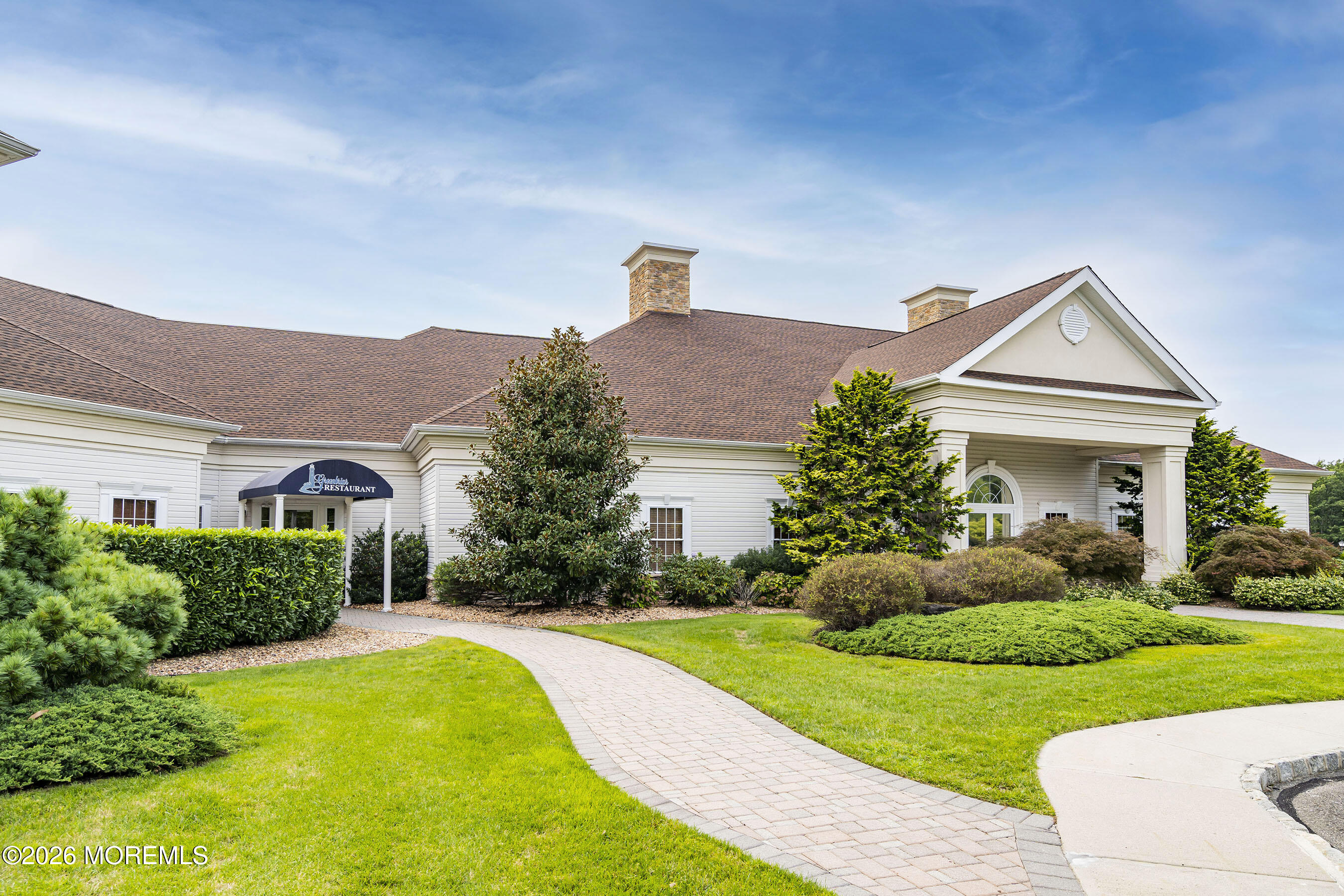 8 Fairhaven Way Waretown, NJ 08758 - Photo 53 of 68 a front view of a house with a yard