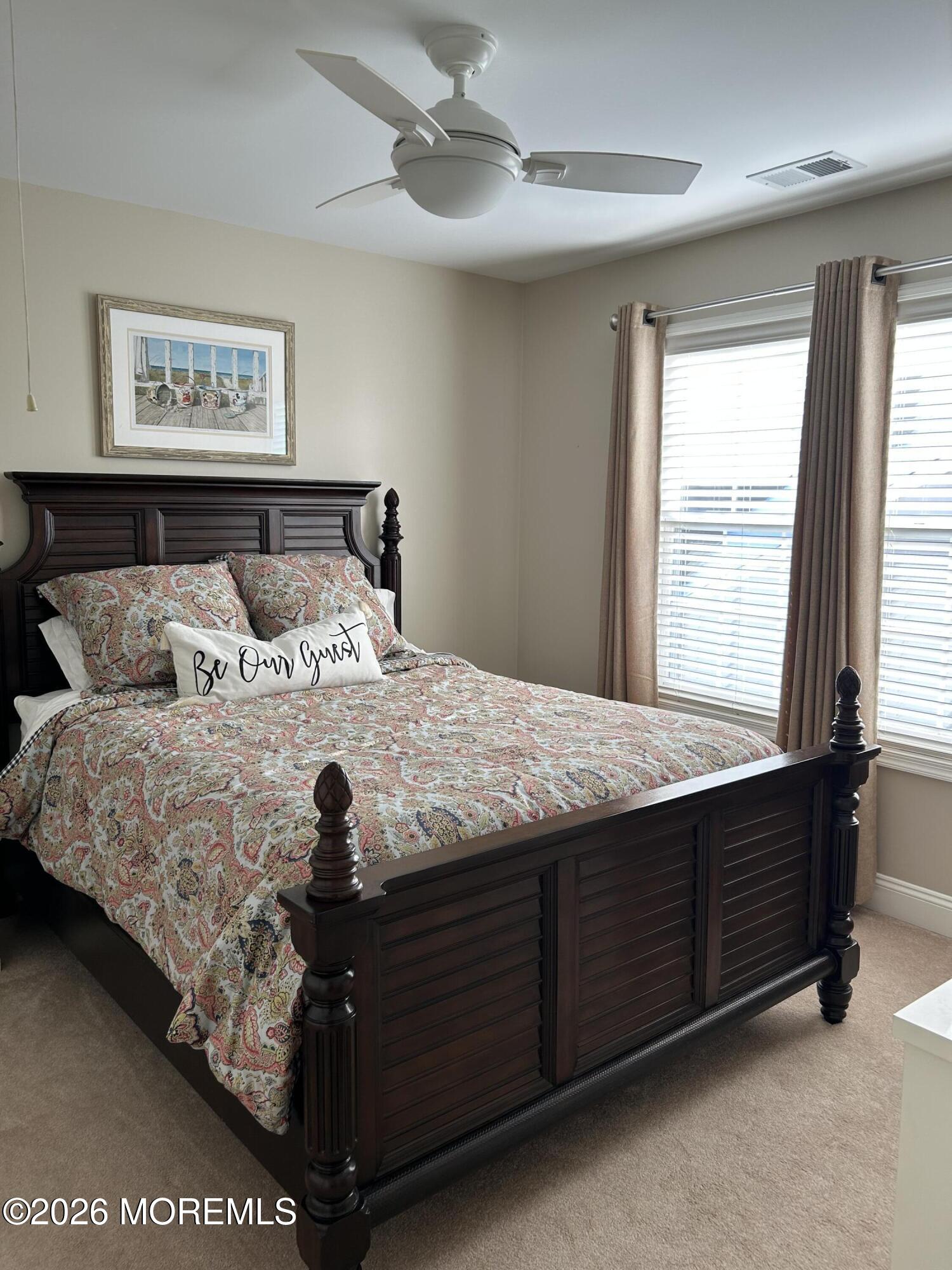 8 Fairhaven Way Waretown, NJ 08758 - Photo 65 of 68 a bedroom with a bed and window