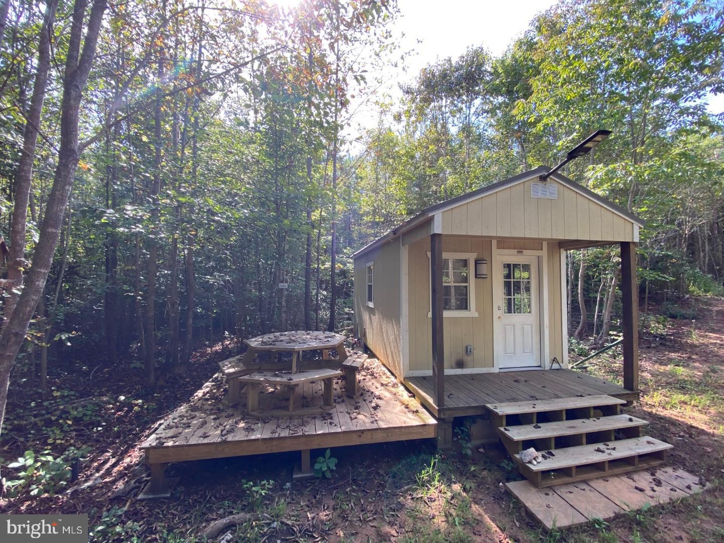 684 Squirrel Hollow Road Alberta, VA 23821 - Photo 16 of 43 Charming cabin nestled in serene woods.