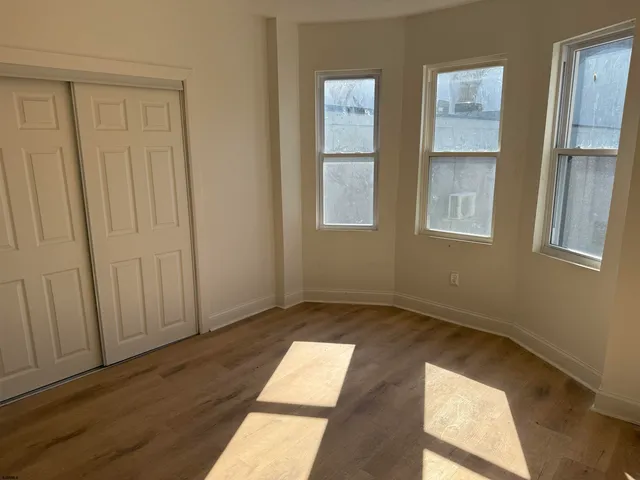 a view of hallway with windows