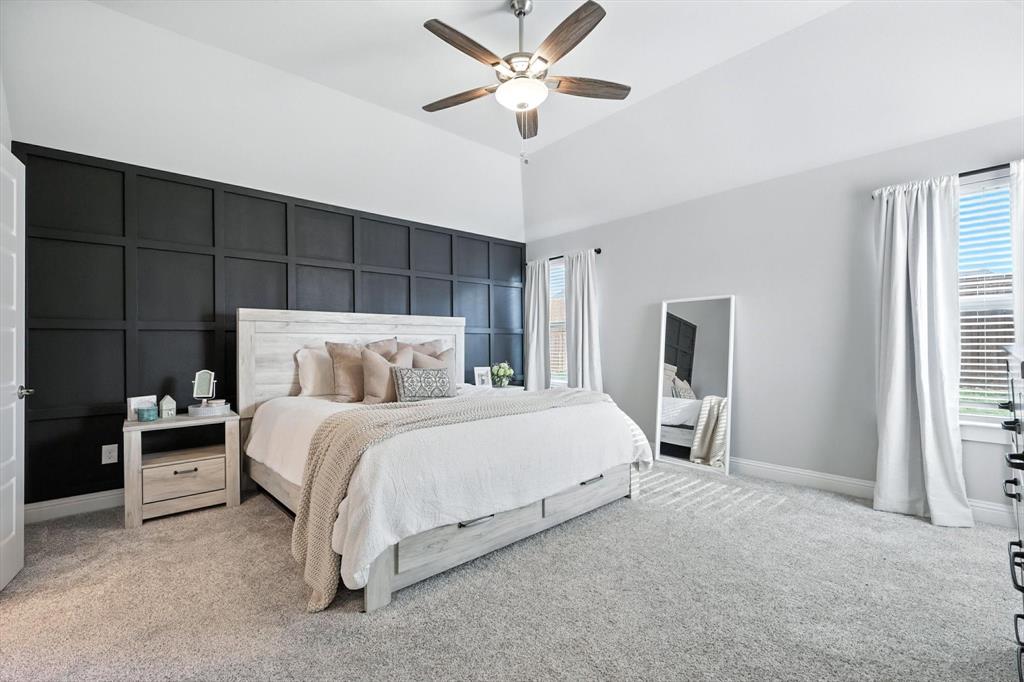 705 Chaparral Road Sanger, TX 76266 - Photo 19 of 38 a bedroom with bed and a window