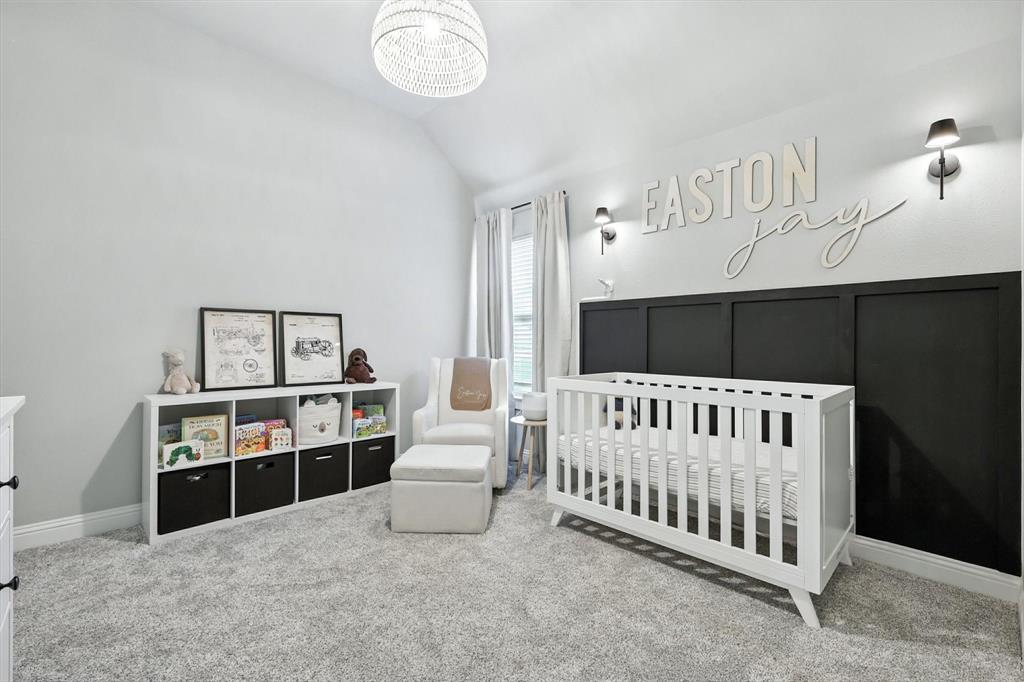 705 Chaparral Road Sanger, TX 76266 - Photo 24 of 38 a bedroom with furniture and window