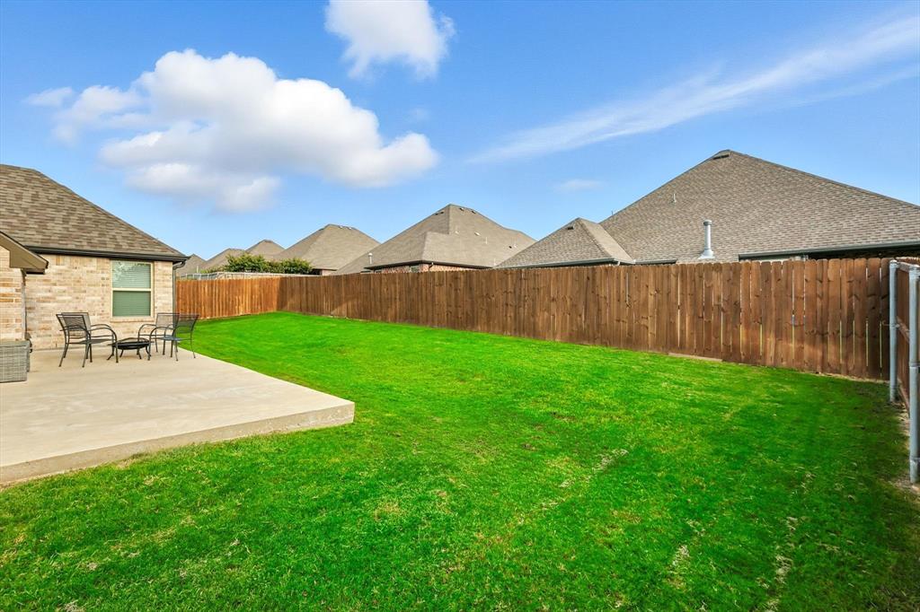 705 Chaparral Road Sanger, TX 76266 - Photo 30 of 38 a view of outdoor space yard and patio