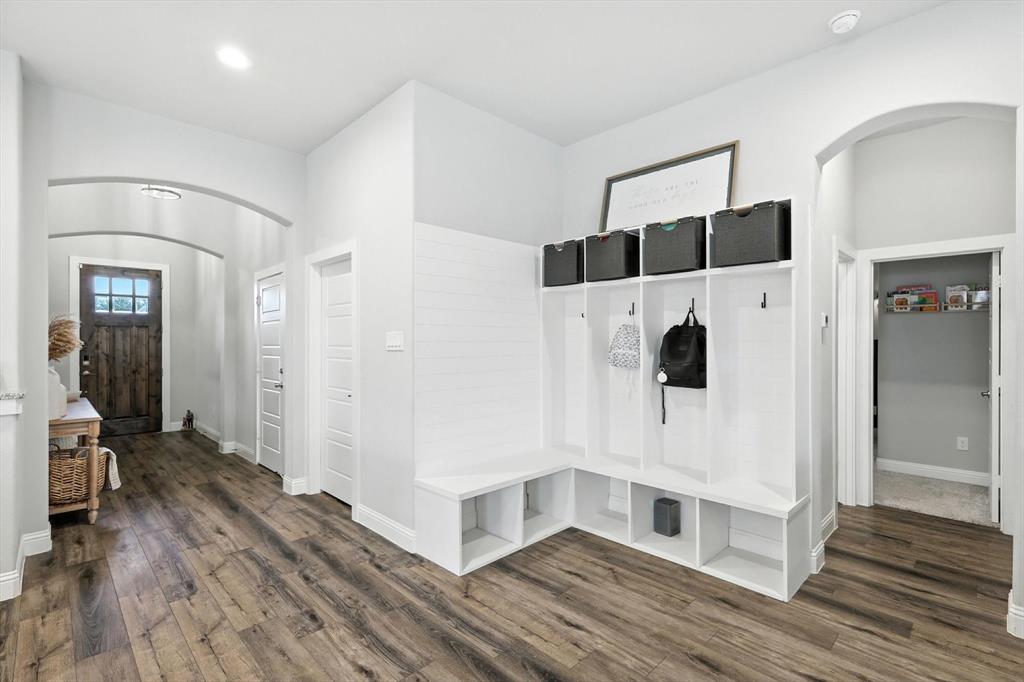 705 Chaparral Road Sanger, TX 76266 - Photo 3 of 38 a view of a livingroom with wooden floor