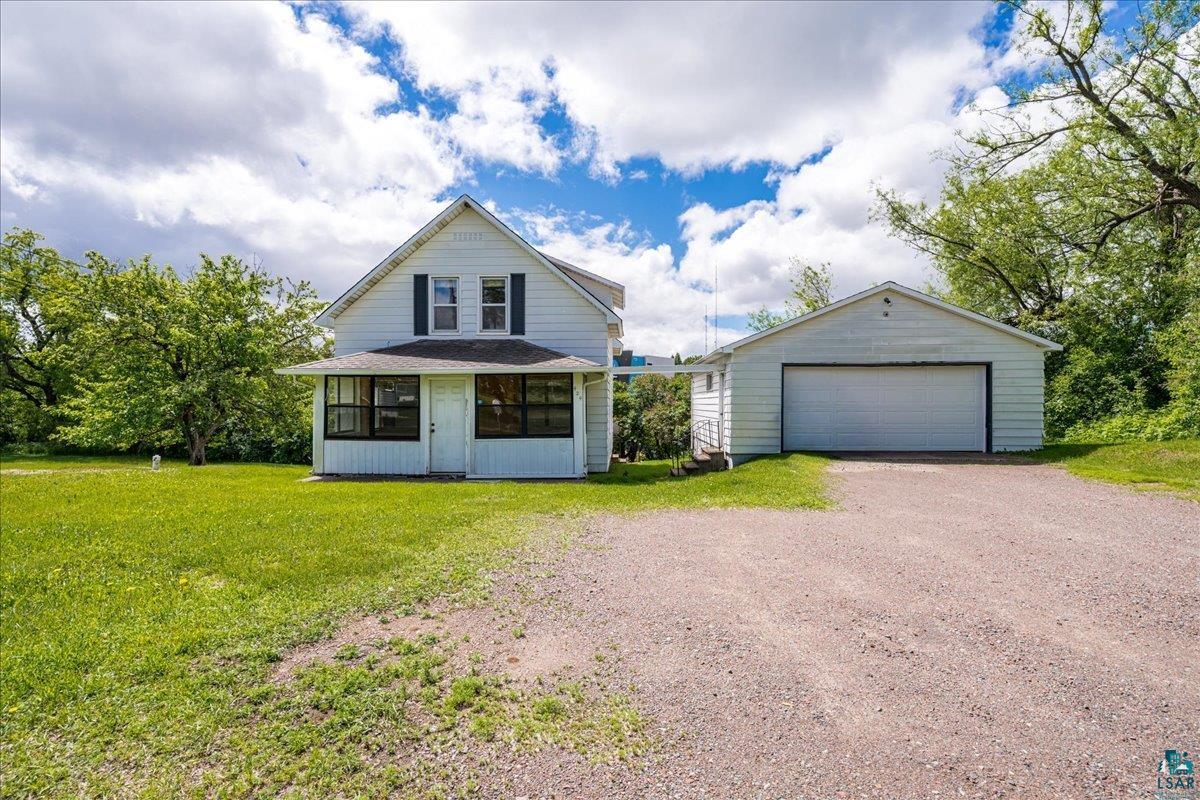 424 East Upham Road Duluth, MN 55811 - Photo 23 of 38 Gabled residence with white siding and dark window shutters