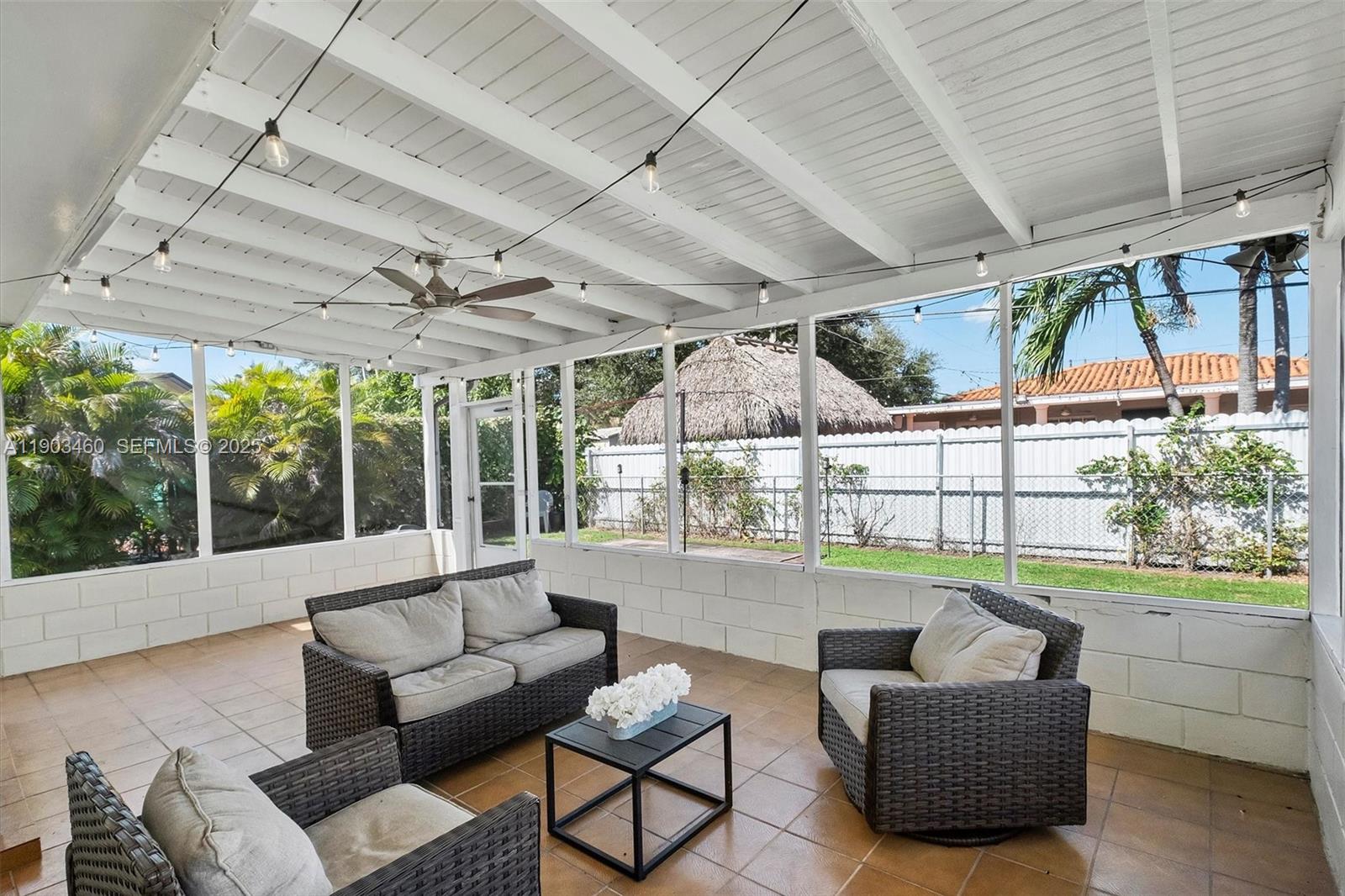 7231 Southwest 6th Street Miami, FL 33144 - Photo 22 of 34 a balcony with furniture and a garden