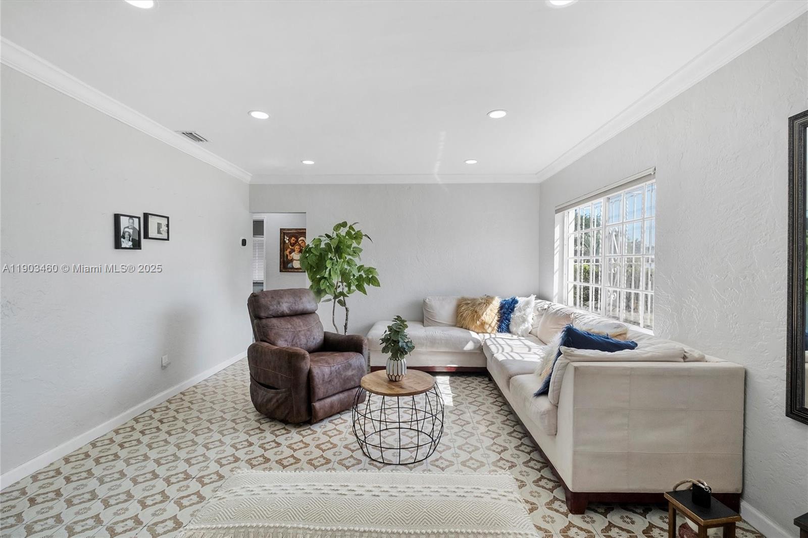 7231 Southwest 6th Street Miami, FL 33144 - Photo 3 of 34 a living room with furniture rug and window