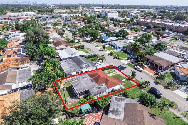 an aerial view of a city with lots of residential buildings