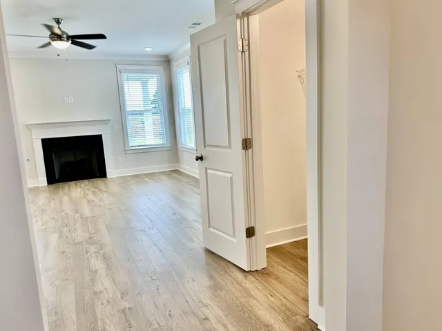 a view of a livingroom with wooden floor