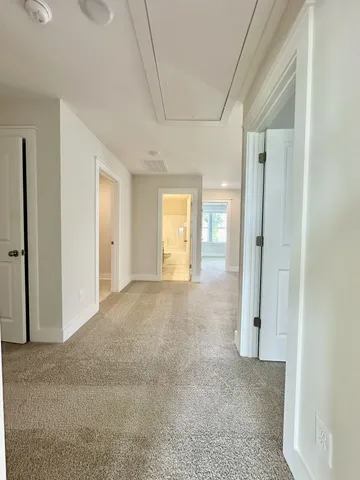 a view of a bathroom with a glass door