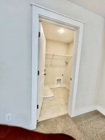 a spacious bathroom with a sink a mirror and a bathtub